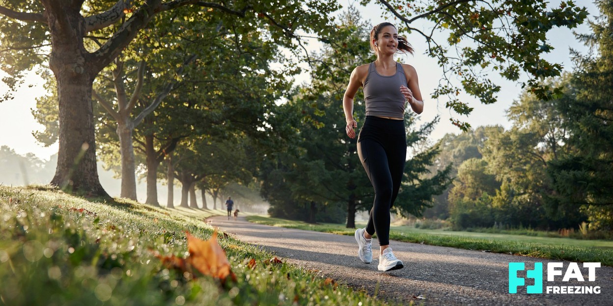 A healthy, fit woman in activewear walking outdoors in soft morning light, conveying an active and balanced lifestyle